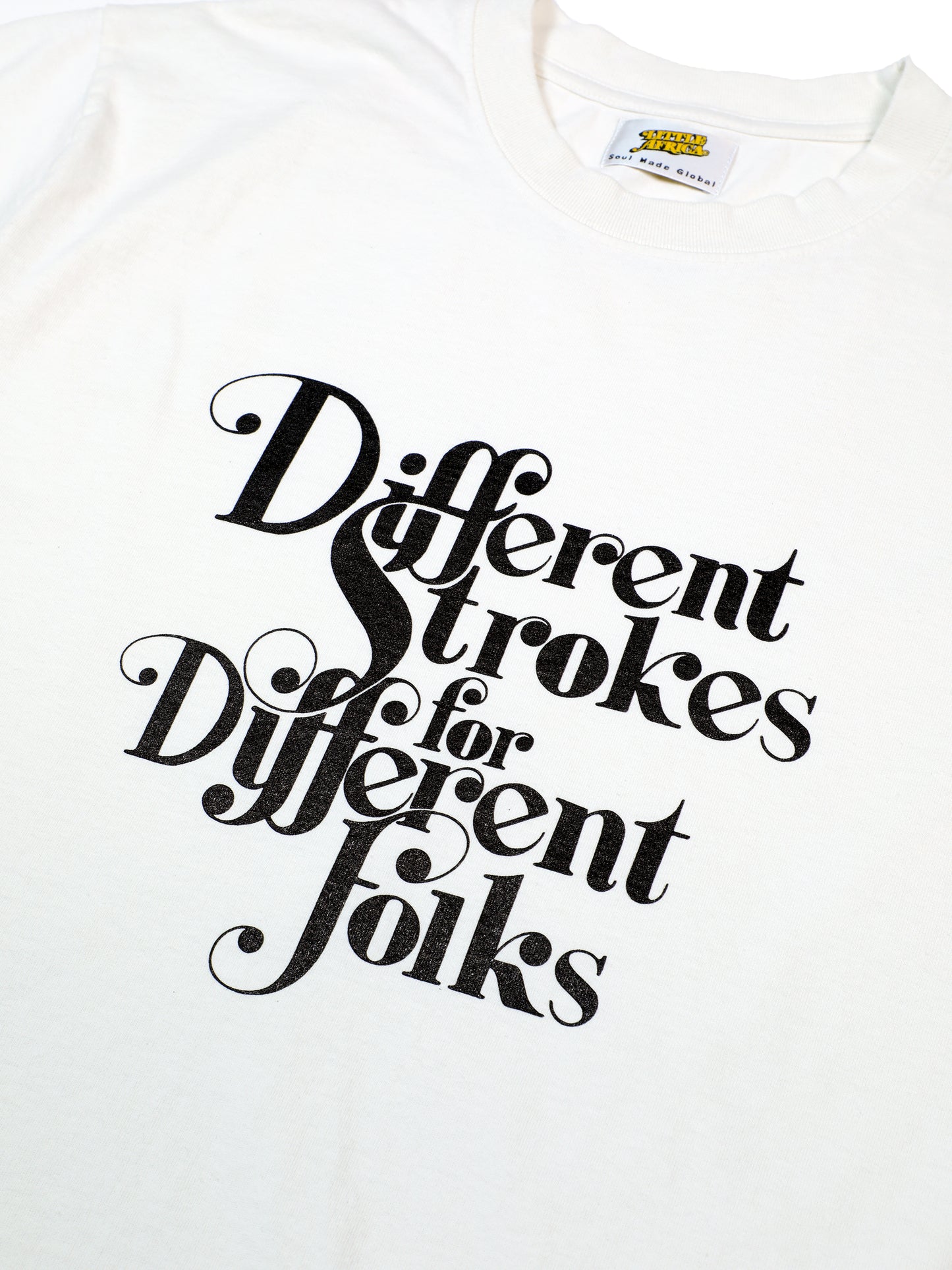 LITTLE AFRICA "Different Strokes Tee" (White)